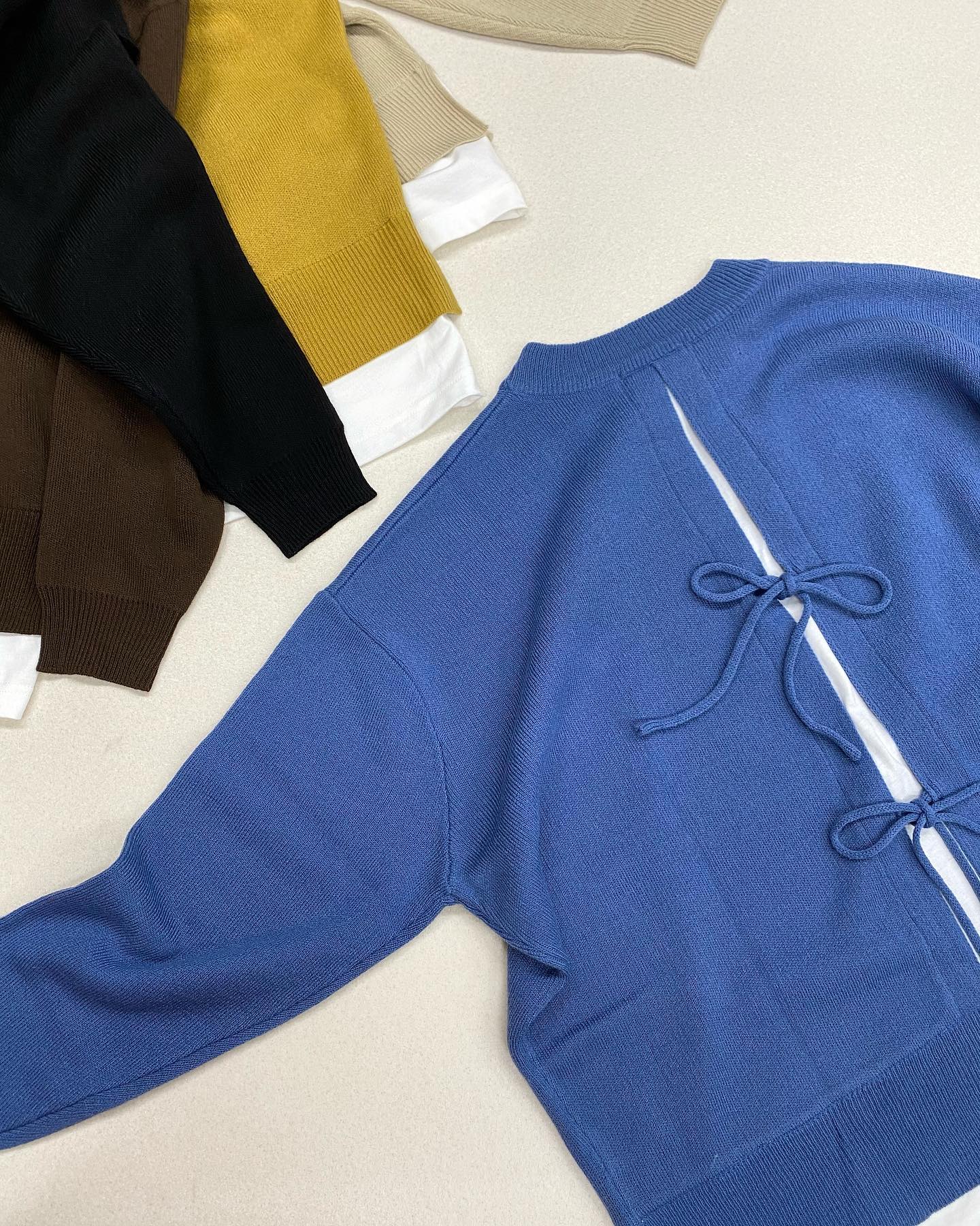.【new  color】?RW037512B001 Fﾚｲﾔｰﾄﾞﾊﾞｯｸﾘﾎﾞﾝﾆｯﾄ▷¥3,190（税込）∥color∥﻿ blue他の色も追加入荷します#retrogirl_ootd#レトロガール#レトロガールコーデ#トレンドファッション#プチプラコーデ#レイヤード #フェイクレイヤード#バックリボンニット #ブルー #マスタードカラー